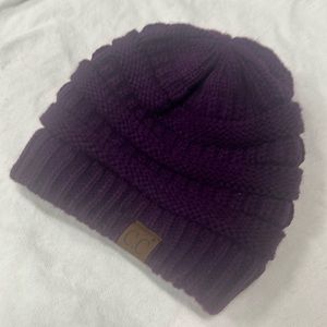 Women’s CC purple knit beanie. Like new